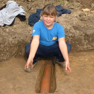 Sarah excavating a drain at Knights Templar site